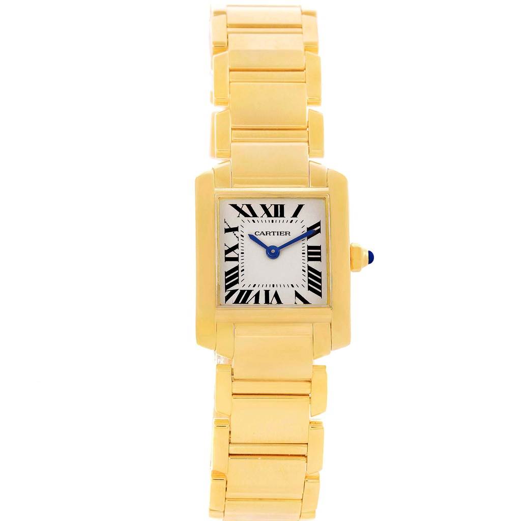 The image shows a frontal view of a Cartier Tank Française watch, highlighting its gold case and bracelet, and Roman numeral dial.