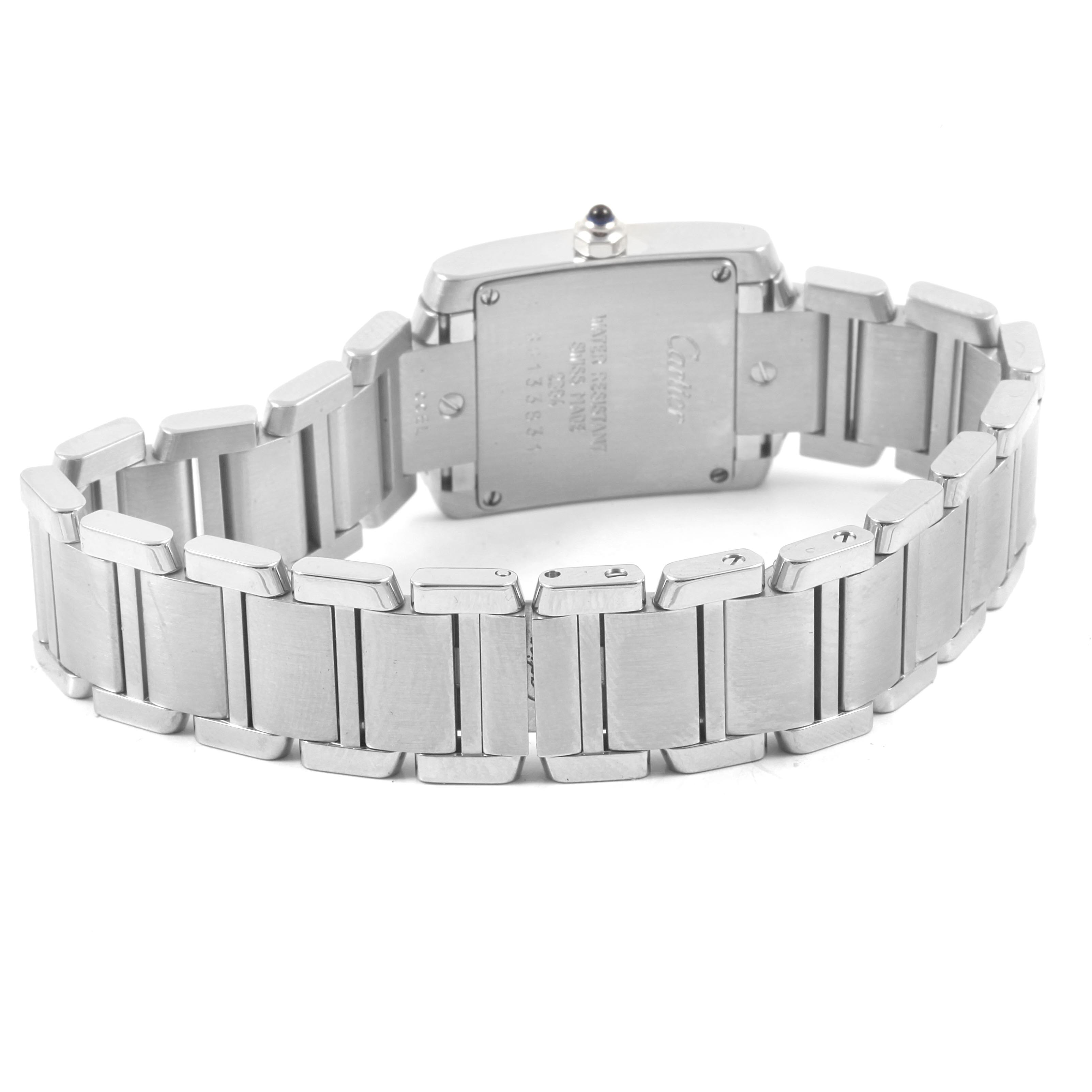 The image shows the back and bracelet of a Cartier Tank Française watch from a rear angle.