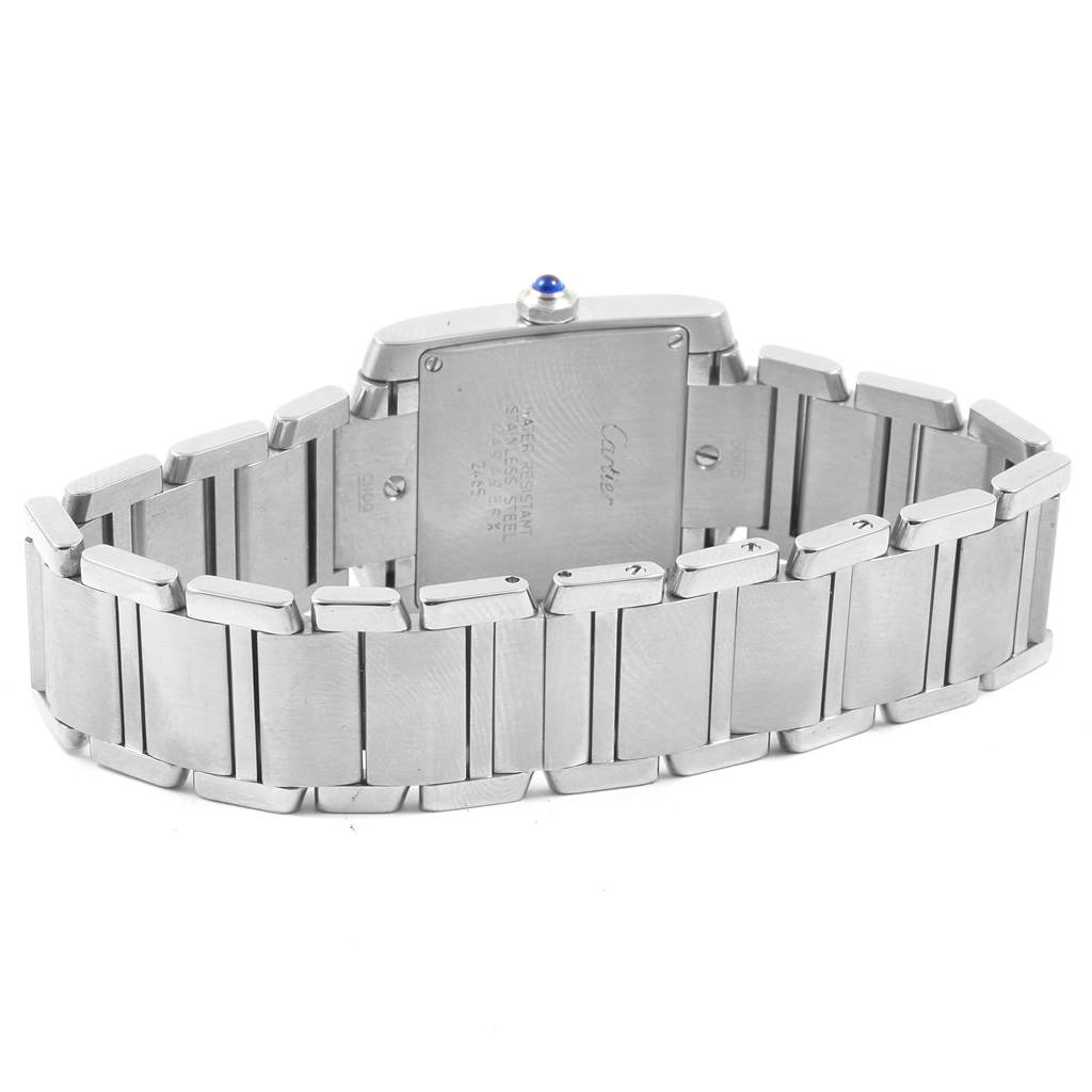 The image shows the back of the Cartier Tank Francaise W51011Q3 Women's Stainless Steel Silver Dial W51011Q3 Women's Stainless Steel Silver Dial watch, highlighting its stainless steel bracelet and case back.