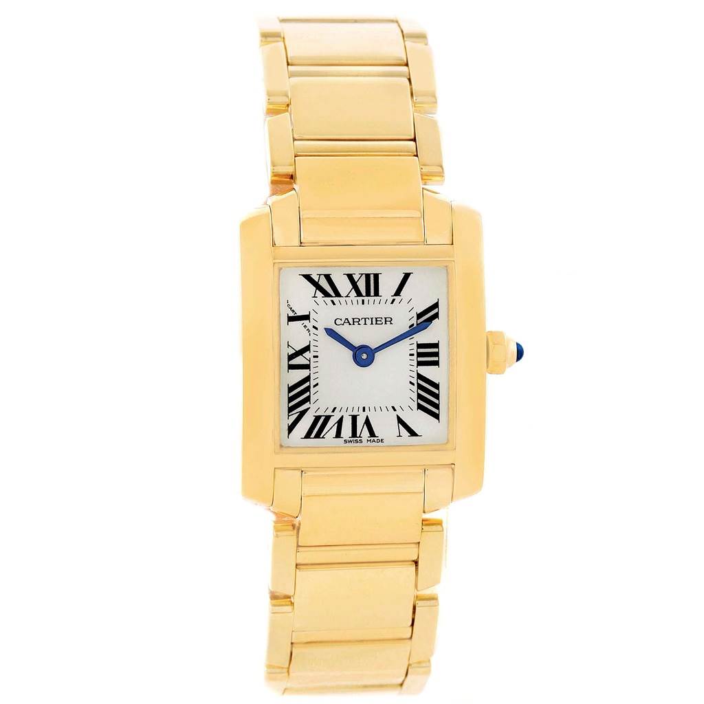 The image shows a Cartier Tank Française watch, viewed from the front, displaying its gold bracelet, rectangular case, and Roman numeral dial.