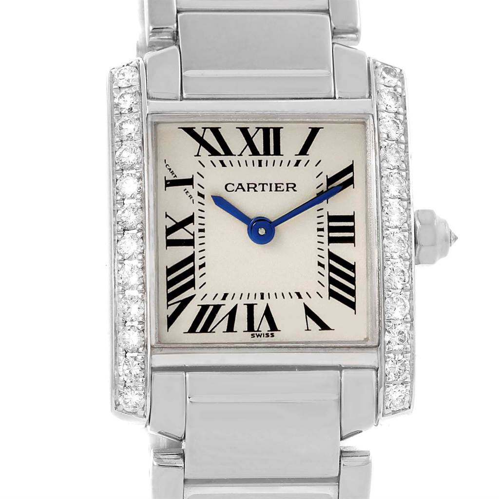 The image shows a close-up, front view of the Cartier Tank Francaise WE1002S3 Women's White Gold Silver Dial WE1002S3 Women's White Gold Silver Dial watch with its dial, hands, and part of the bracelet visible.
