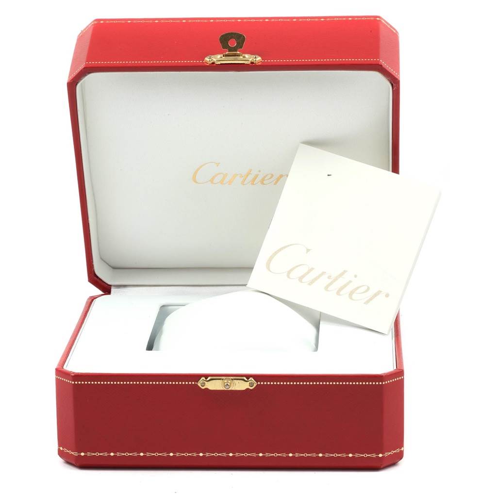 A Cartier Tank Francaise WE1002S3 Women's White Gold Silver Dial WE1002S3 Women's White Gold Silver Dial watch box is shown open with a Cartier booklet inside.