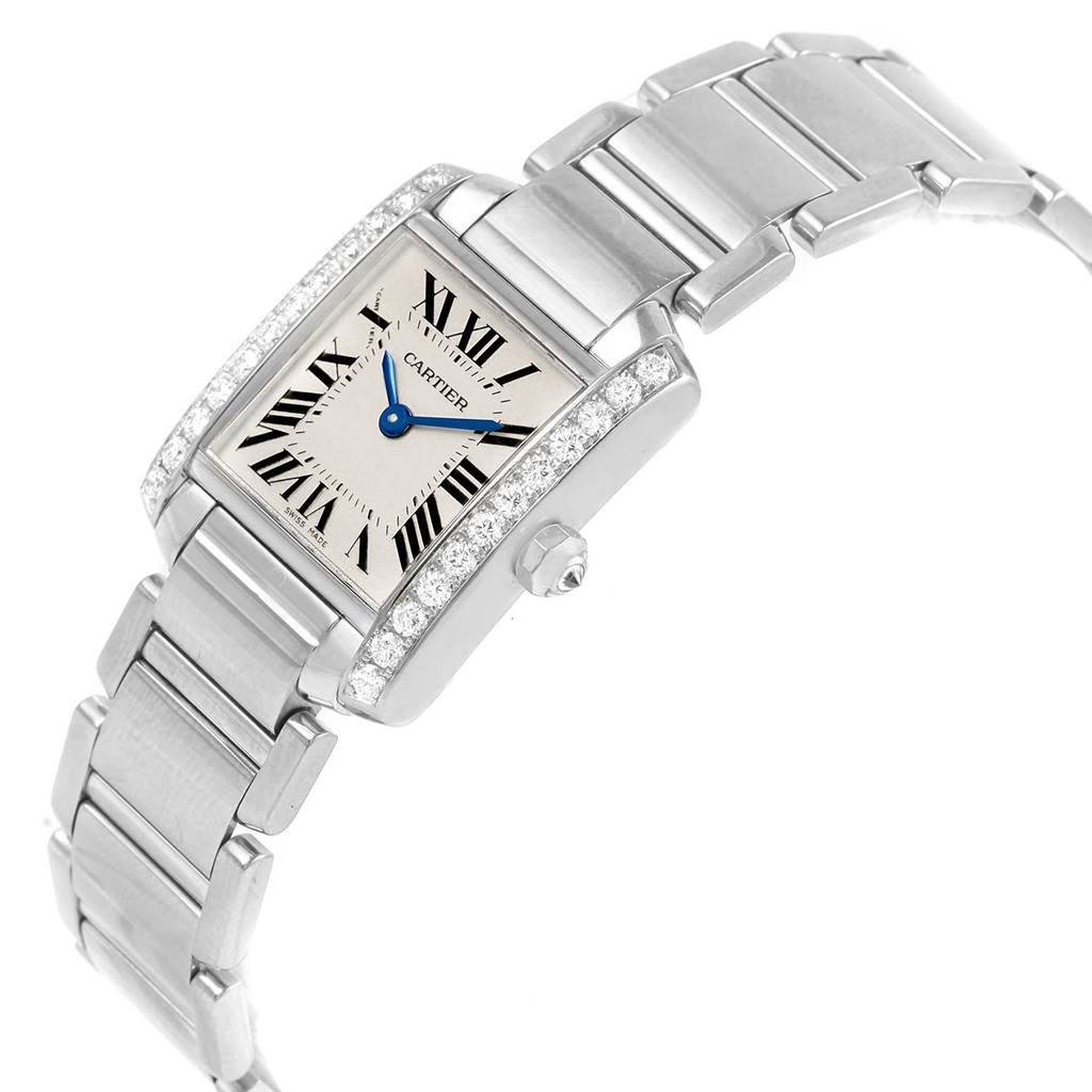 The Cartier Tank Francaise WE1002S3 Women's White Gold Silver Dial WE1002S3 Women's White Gold Silver Dial watch is shown at a slight angle, displaying the face, crown, and part of the bracelet.