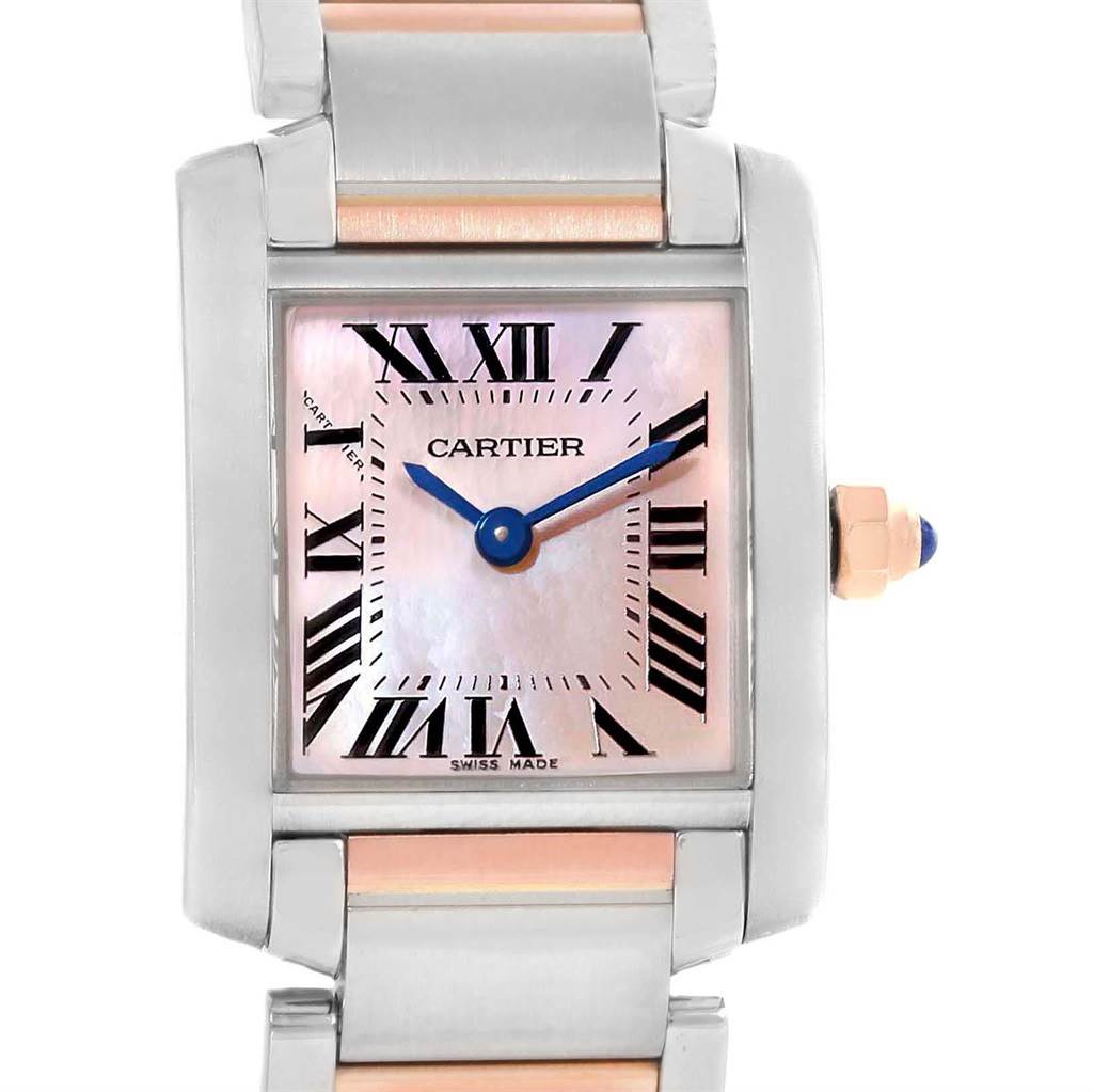 Close-up of the dial and part of the bracelet of a Cartier Tank Francaise W51027Q4 Women's Steel and Gold (two tone) Mother of Pearl Dial W51027Q4 Women's Steel and Gold (two tone) Mother of Pearl Dial watch, displaying Roman numerals and blue hands.