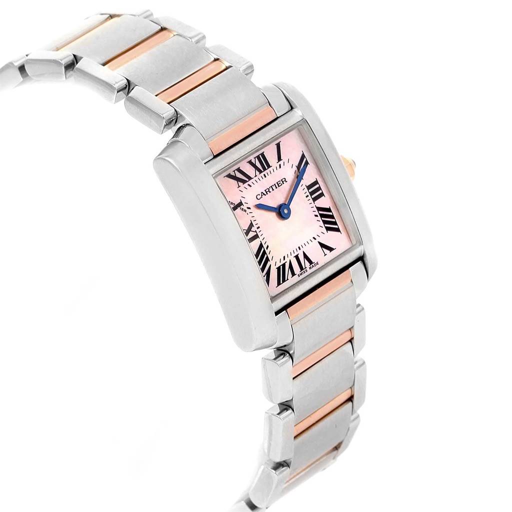 The image shows a Cartier Tank Francaise W51027Q4 Women's Steel and Gold (two tone) Mother of Pearl Dial W51027Q4 Women's Steel and Gold (two tone) Mother of Pearl Dial watch at an angle highlighting the face, Roman numeral dial, and metal bracelet with pink accents.