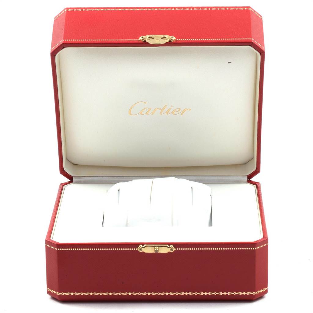 The image shows an open Cartier Tank Francaise W51007Q4 Women's Steel and Gold (two tone) Silver Dial W51007Q4 Women's Steel and Gold (two tone) Silver Dial watch box at eye level, displaying its interior with white cushioning.