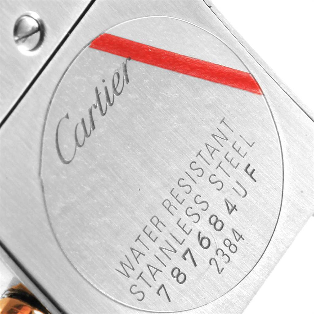 This image shows the back case of the Tank Française model by Cartier, highlighting its stainless steel and water-resistant features.