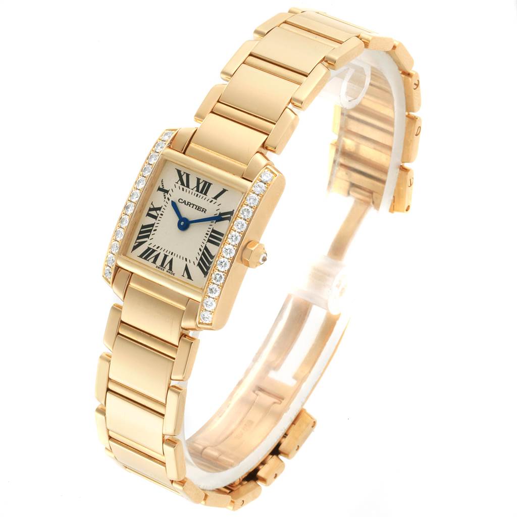 The image shows a Cartier Tank Française watch from a slightly tilted front view, highlighting the face, bezel, and bracelet.