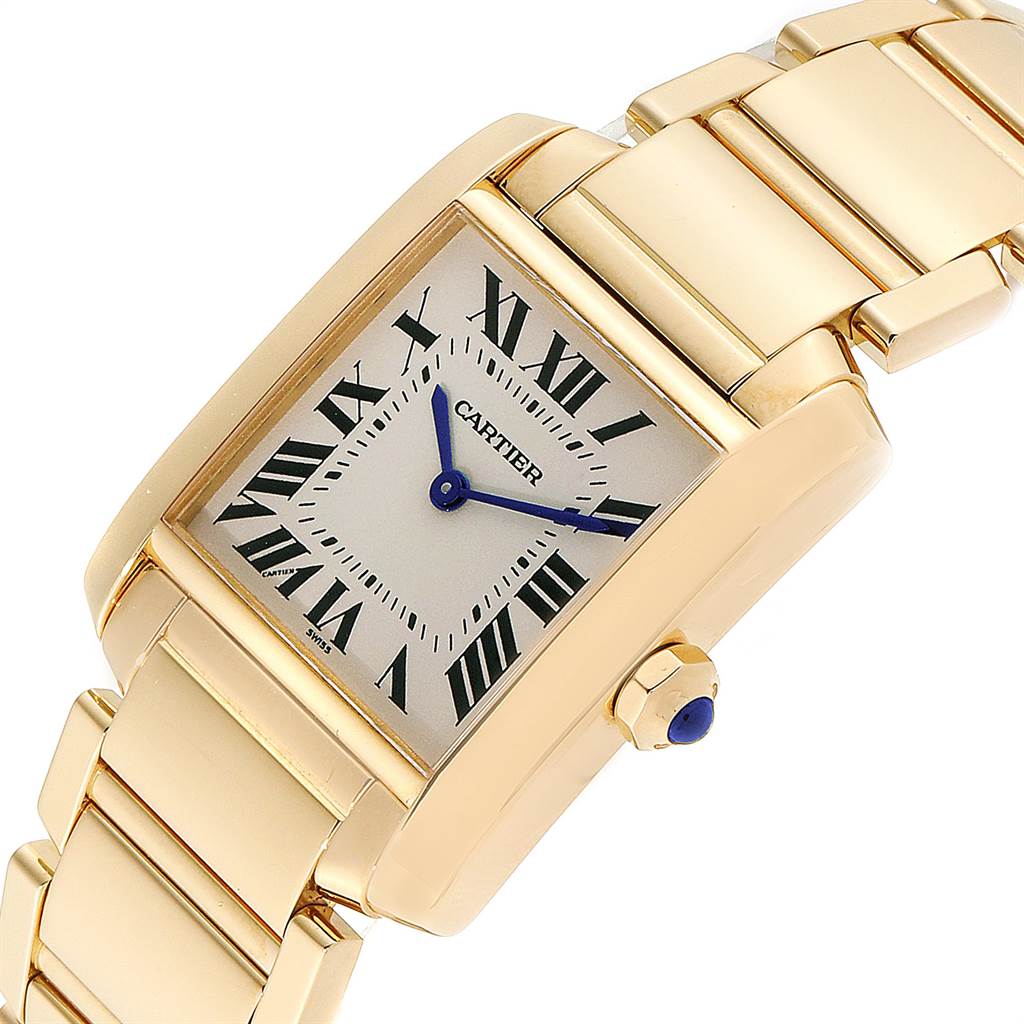 The image shows a close-up, angled view of the Cartier Tank Francaise W50003N2 Women's Yellow Gold Silver Dial W50003N2 Women's Yellow Gold Silver Dial watch, highlighting the face, Roman numerals, and part of the gold bracelet.