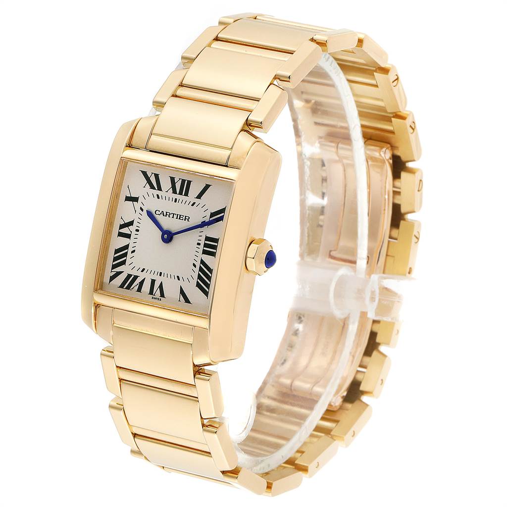 The Cartier Tank Francaise W50003N2 Women's Yellow Gold Silver Dial W50003N2 Women's Yellow Gold Silver Dial watch is shown at a front left angle, highlighting its gold rectangular case, silver dial, and gold bracelet.