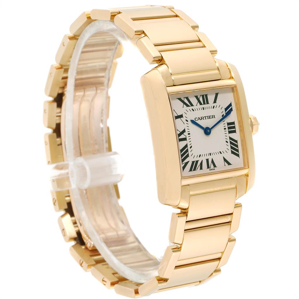 The Cartier Tank Francaise W50003N2 Women's Yellow Gold Silver Dial W50003N2 Women's Yellow Gold Silver Dial watch is shown from a front-side angle, displaying its gold case, bracelet, and Roman numeral dial.