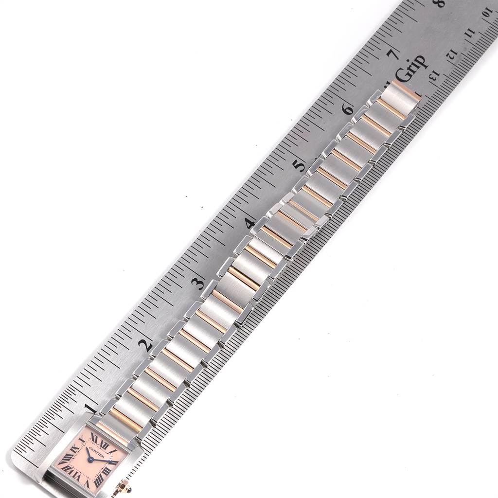 The image shows the bracelet and part of the face of a Cartier Tank Francaise W51027Q4 Women's Steel and Gold (two tone) Mother of Pearl Dial W51027Q4 Women's Steel and Gold (two tone) Mother of Pearl Dial watch, measured against a ruler.