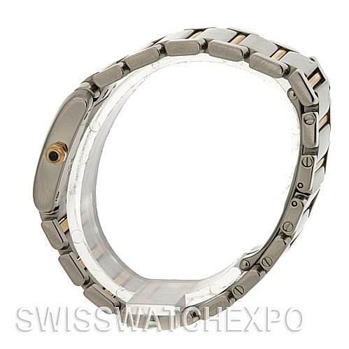 This side view of the Cartier Tank Francaise W51007Q4 Women's Yellow Gold Silver Dial W51007Q4 Women's Yellow Gold Silver Dial watch highlights its bracelet and crown.