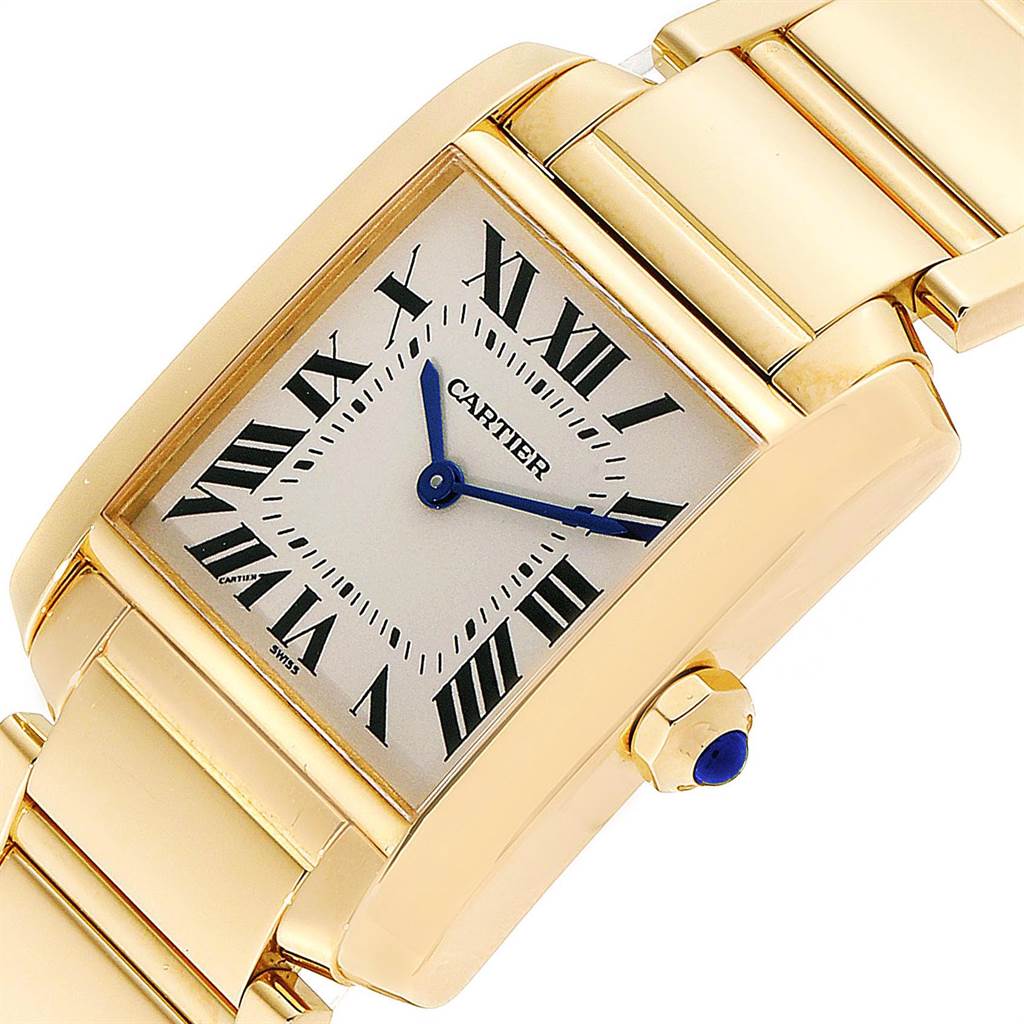 The image shows a close-up view of the Cartier Tank Francaise W50003N2 Women's Yellow Gold Silver Dial W50003N2 Women's Yellow Gold Silver Dial watch, highlighting its dial, bracelet, and crown.