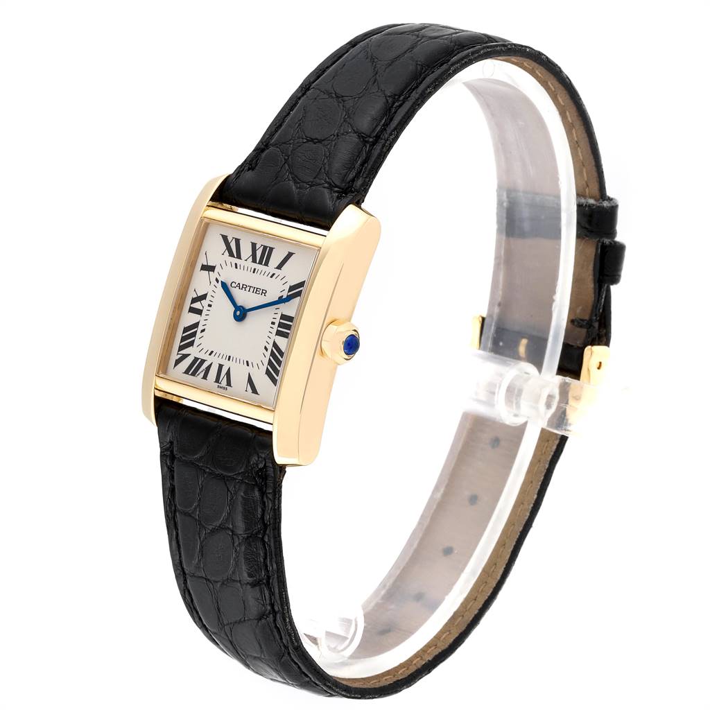 The image shows a Tank Française watch by Cartier, with its face and black leather strap visible, viewed at a slight angle.