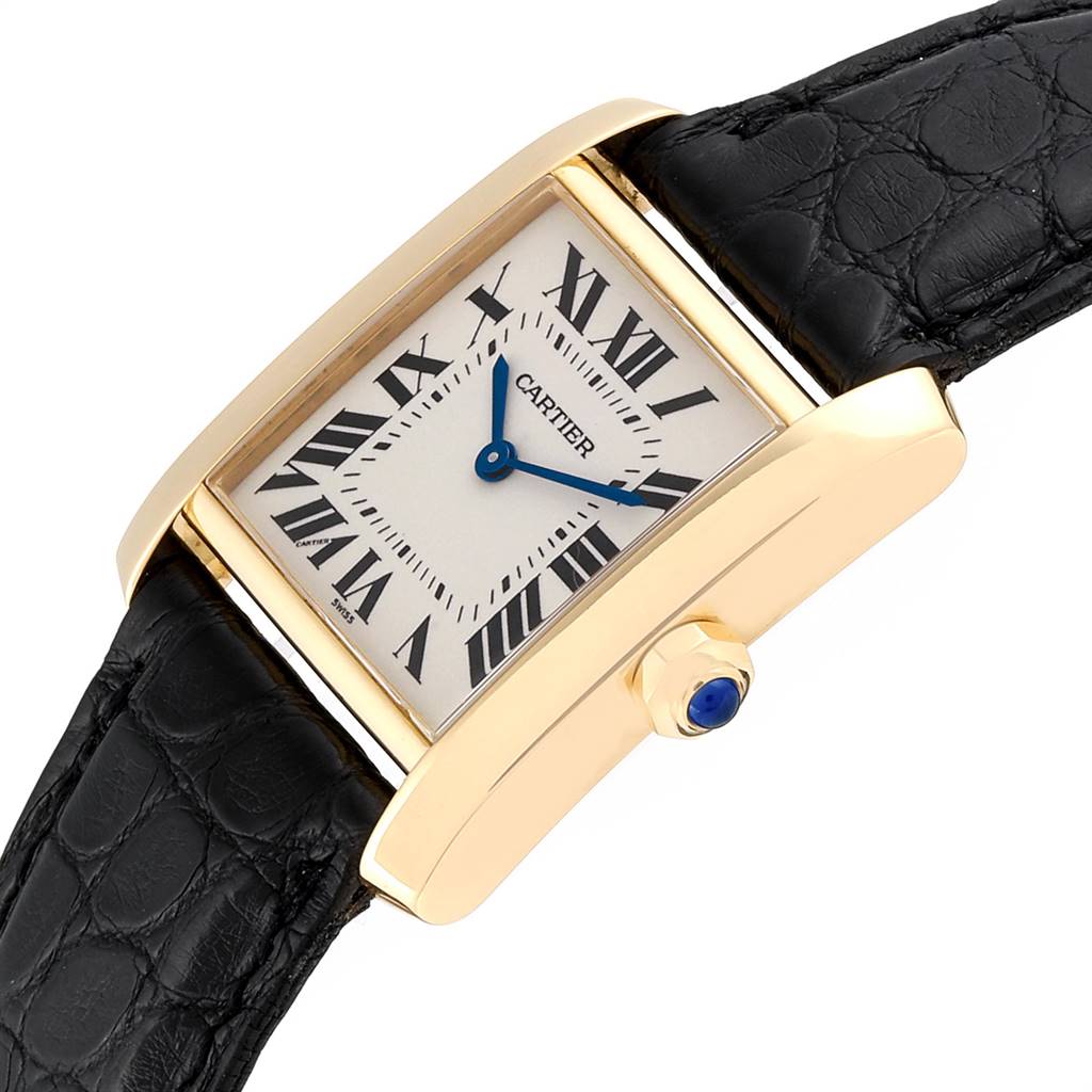 The Cartier Tank Francaise W50003N2 Women's Yellow Gold Silver Dial W50003N2 Women's Yellow Gold Silver Dial watch is shown at a slight angle, highlighting its rectangular face, crown, and part of the black leather strap.