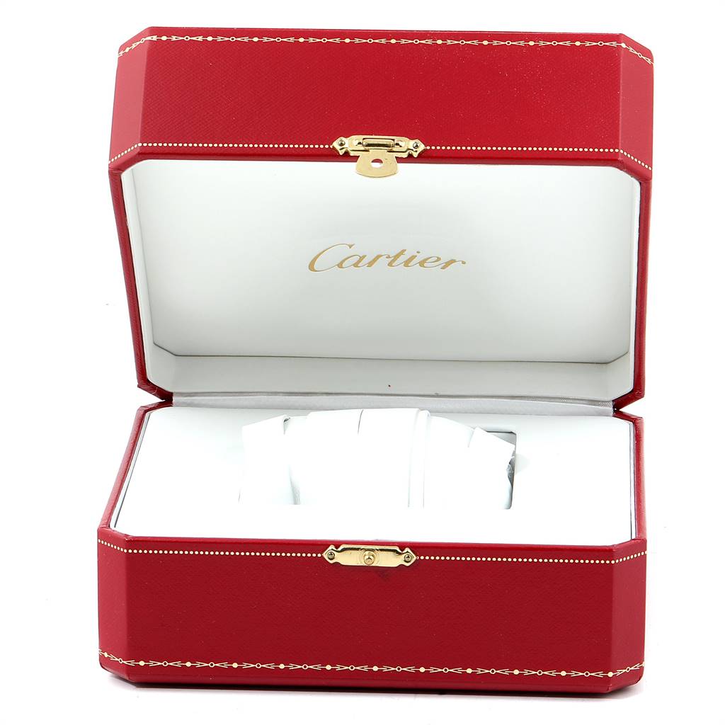 The image shows an open Cartier watch box for the Tank Francaise model, with its pillow insert visible.
