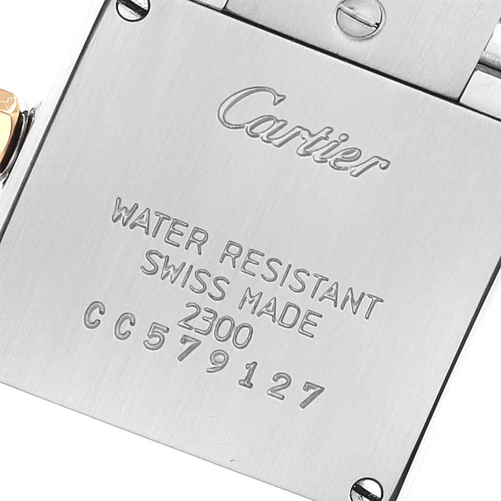 This image shows the engraved back case of a Cartier Tank Francaise W51007Q4 Women's Steel and Gold (two tone) Silver Dial W51007Q4 Women's Steel and Gold (two tone) Silver Dial watch, detailing water resistance and other specifications.