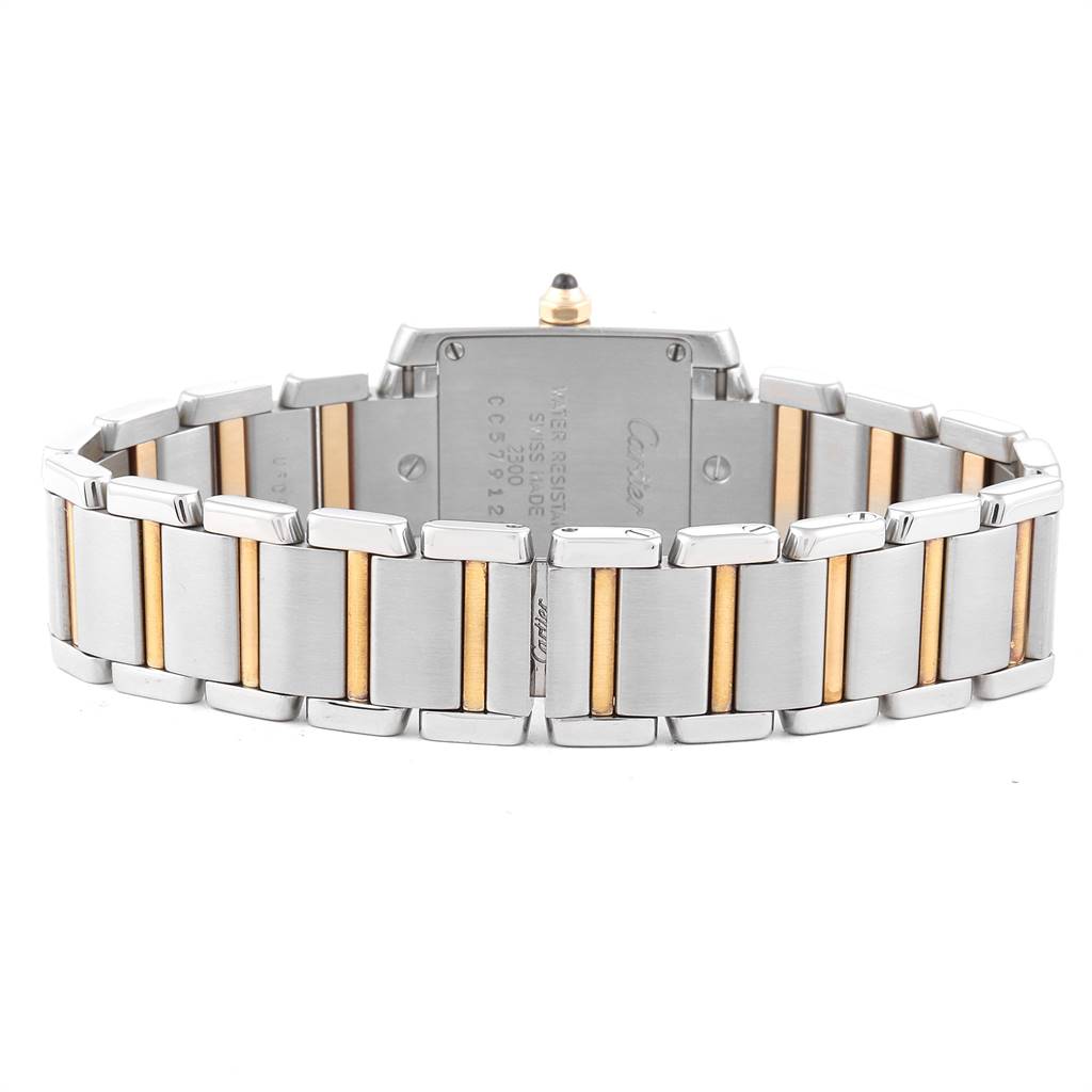 The image shows the back view of a Cartier Tank Francaise W51007Q4 Women's Steel and Gold (two tone) Silver Dial W51007Q4 Women's Steel and Gold (two tone) Silver Dial watch, highlighting its two-tone metal bracelet and case back details.