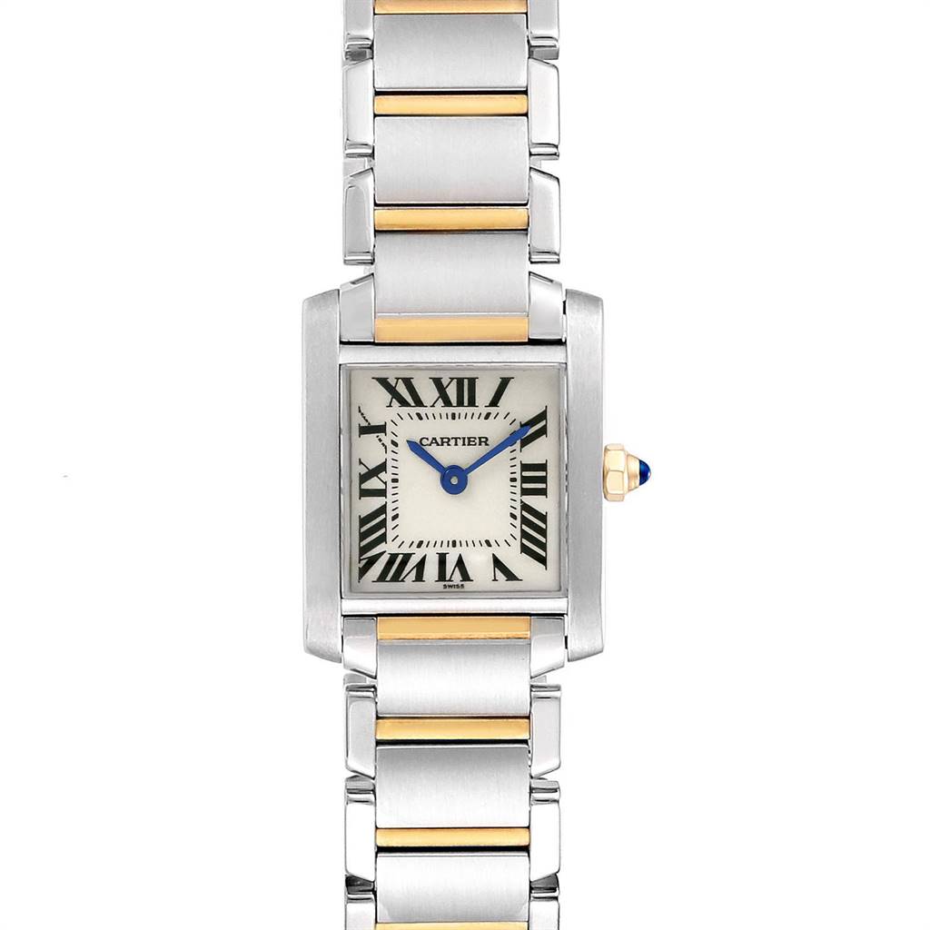The image shows a Cartier Tank Francaise W51007Q4 Women's Steel and Gold (two tone) Silver Dial W51007Q4 Women's Steel and Gold (two tone) Silver Dial watch, highlighting its rectangular face, Roman numerals, blue hands, and metal link bracelet.