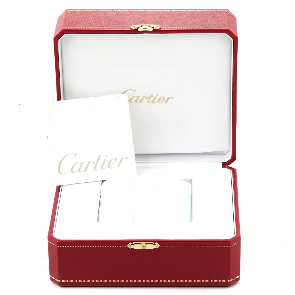 The image shows an open Cartier Tank Francaise W2TA0003 Women's Steel and Gold (two tone) Silver Dial W2TA0003 Women's Steel and Gold (two tone) Silver Dial watch box and accompanying paperwork viewed from the front.