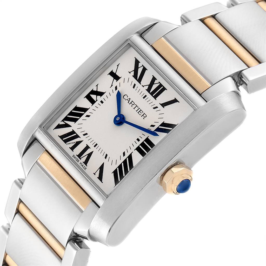 The image shows a close-up, angled view of the Cartier Tank Francaise W2TA0003 Women's Steel and Gold (two tone) Silver Dial W2TA0003 Women's Steel and Gold (two tone) Silver Dial watch face, crown, and part of the bracelet.