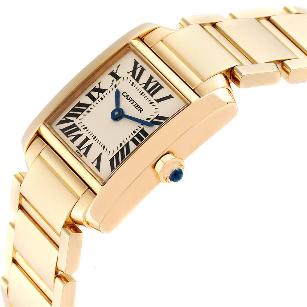 The Cartier Tank Francaise W50002N2 Women's Yellow Gold Silver Dial W50002N2 Women's Yellow Gold Silver Dial watch is shown at an angled side view, focusing on the case, dial, and part of the bracelet.