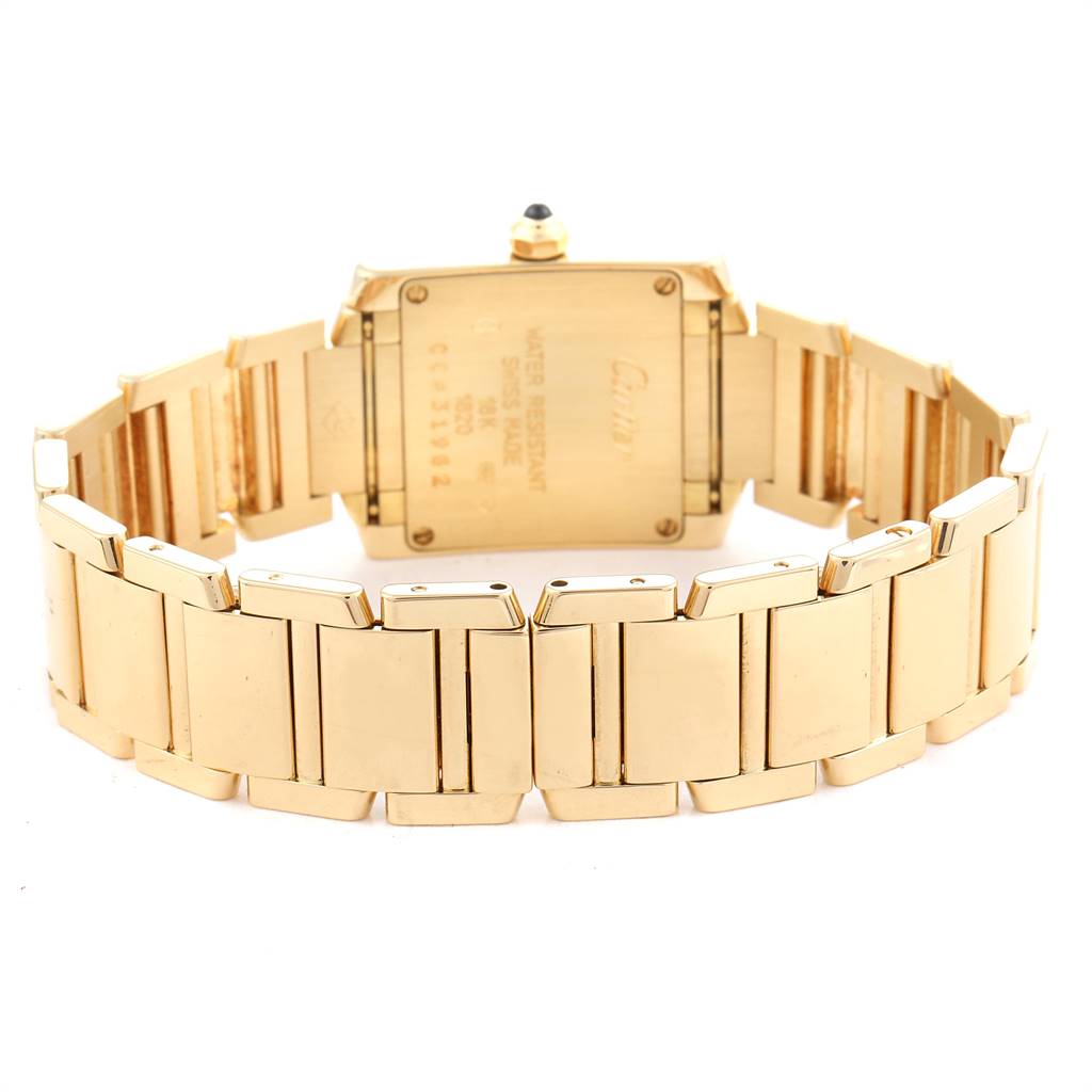 The image shows the case back and bracelet of a Cartier Tank Française watch from a rear angle.