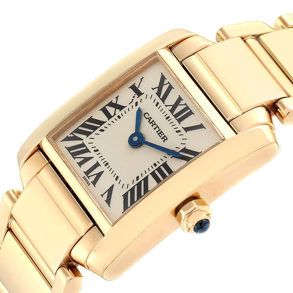 The image shows a close-up angled view of a Cartier Tank Francaise W50002N2 Women's Yellow Gold Silver Dial W50002N2 Women's Yellow Gold Silver Dial watch, highlighting its rectangular face, Roman numerals, and metal bracelet.