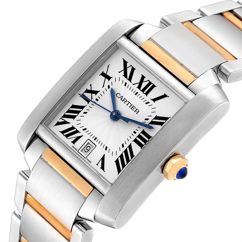 The image shows a close-up angled view of a Cartier Tank Française watch, highlighting its rectangular face, Roman numerals, and two-tone band.