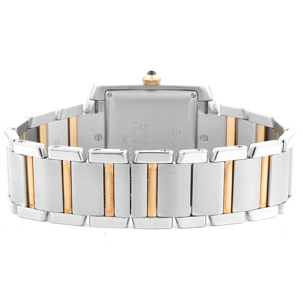 The image shows the back view of a Cartier Tank Francaise W51005Q4 Men's Steel and Gold (two tone) Silver Dial W51005Q4 Men's Steel and Gold (two tone) Silver Dial watch, focusing on the clasp and metal bracelet.