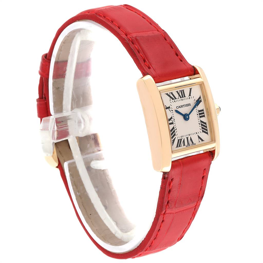 The Cartier Tank Francaise W5000256 Women's Yellow Gold Silver Dial W5000256 Women's Yellow Gold Silver Dial watch is shown from a slight side angle, highlighting its red leather strap and rectangular dial.