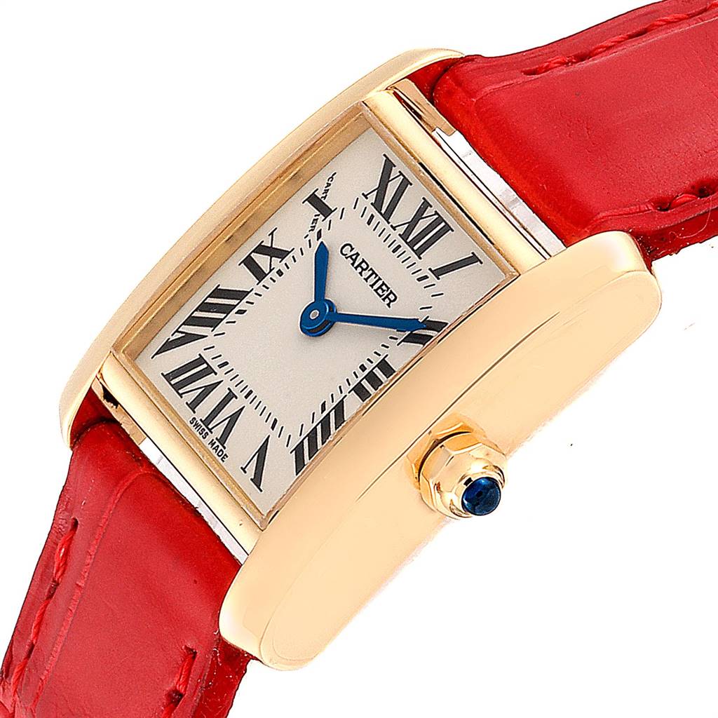 The image shows a close-up side angle view of the Cartier Tank Française watch, highlighting its rectangular face, Roman numerals, and red leather strap.