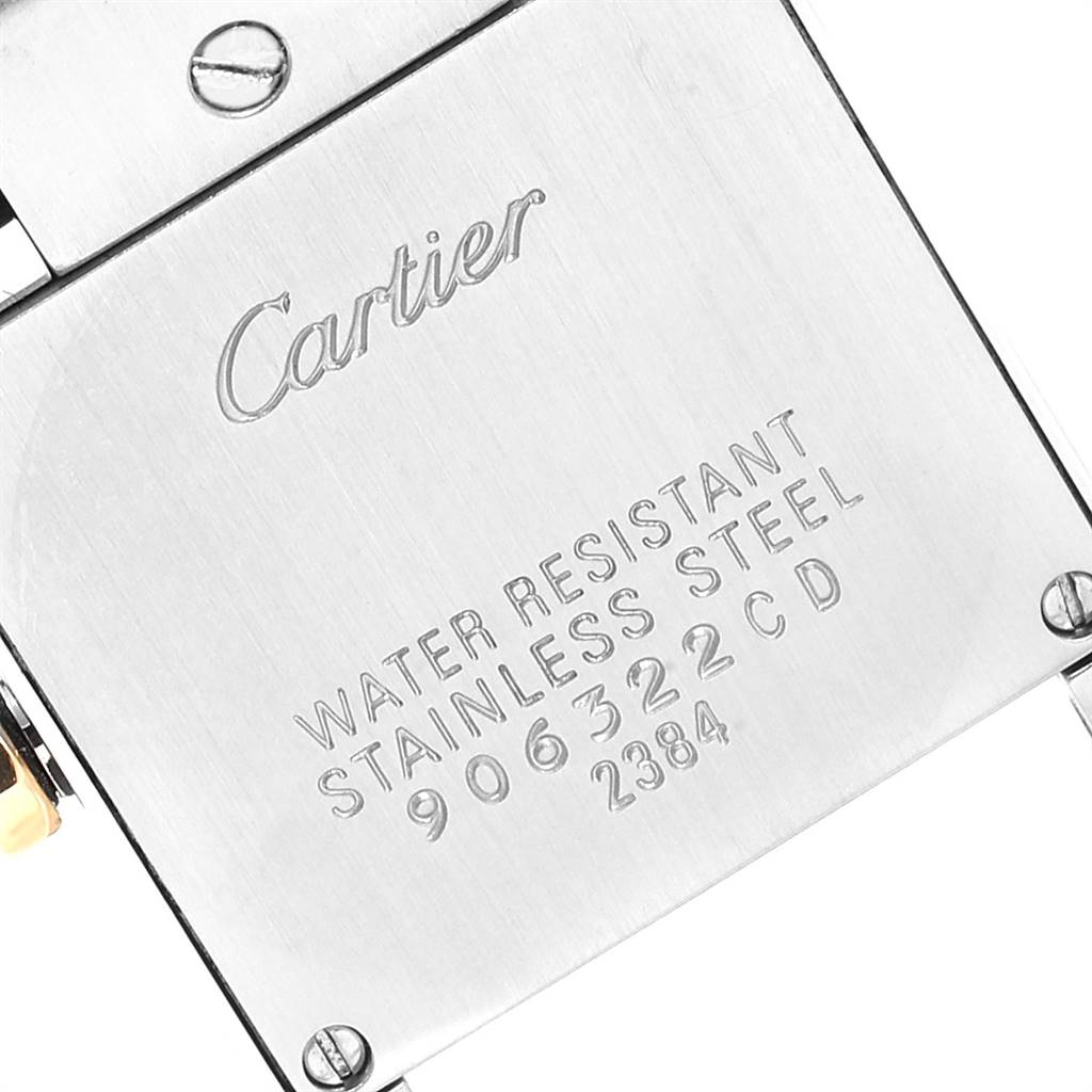 This image shows the back case of a Cartier Tank Francaise W51007Q4 Women's Steel and Gold (two tone) Silver Dial W51007Q4 Women's Steel and Gold (two tone) Silver Dial watch, displaying brand engraving and water resistance information.