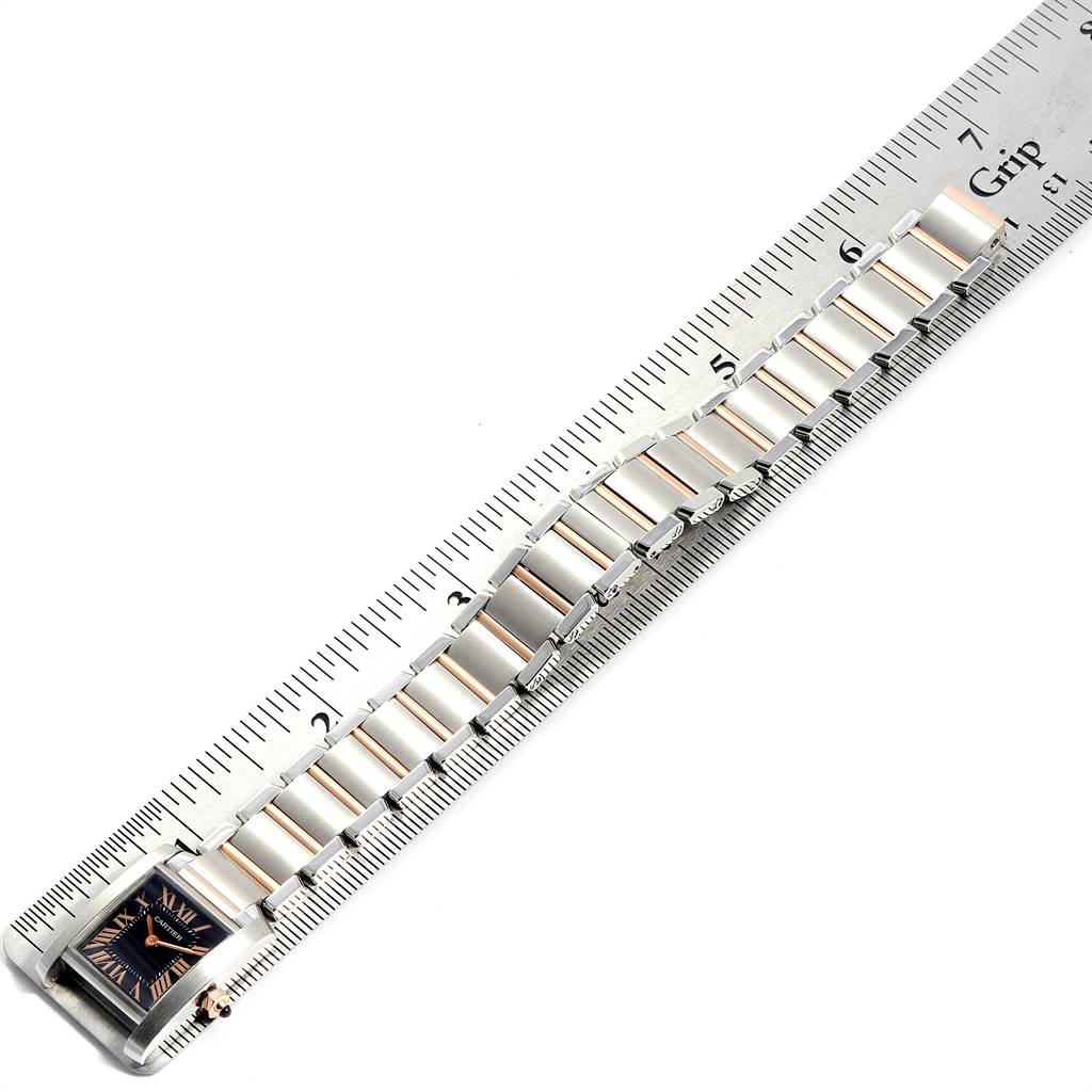 The image shows the bracelet and square face of a Cartier Tank Francaise W5010001 Women's Steel and Gold (two tone) Black Dial W5010001 Women's Steel and Gold (two tone) Black Dial watch, measured with a ruler.