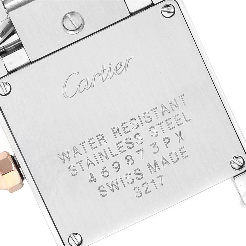 This image shows the back case of a Cartier Tank Francaise W5010001 Women's Steel and Gold (two tone) Black Dial W5010001 Women's Steel and Gold (two tone) Black Dial watch, highlighting its water resistance, material, and serial number.