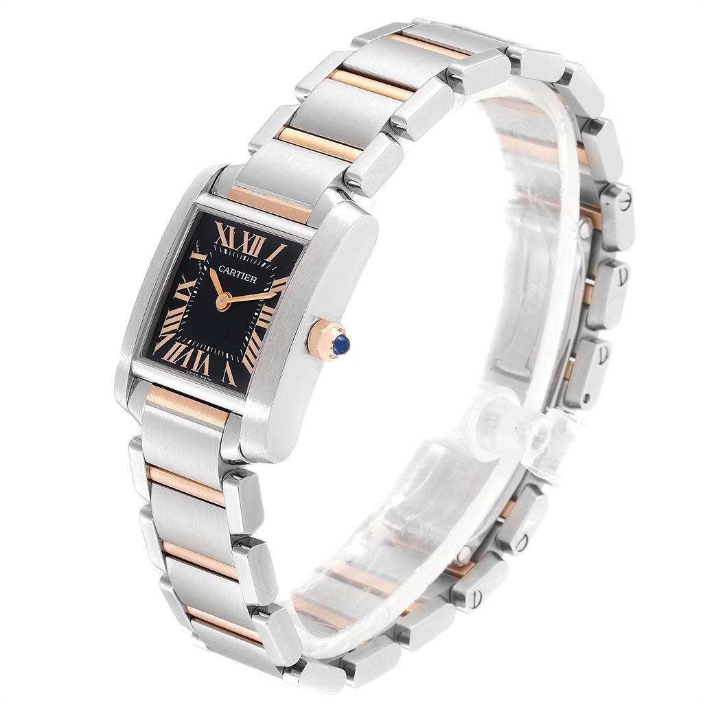 The Cartier Tank Francaise W5010001 Women's Steel and Gold (two tone) Black Dial W5010001 Women's Steel and Gold (two tone) Black Dial watch is shown at an oblique angle, displaying its bracelet, face, and crown with a blue gemstone.