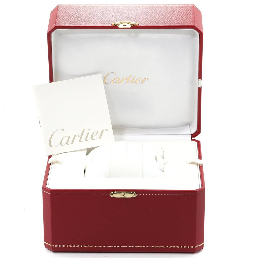 This image shows the open box of the Cartier Tank Francaise WE1002SF Women
s White Gold Silver Dial WE1002SF Women
s White Gold Silver Dial watch, featuring a red case and accompanying booklet.