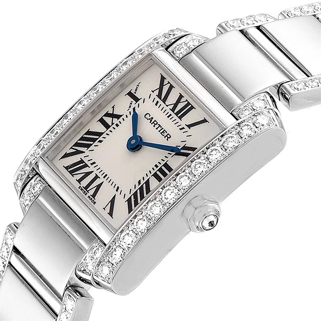 The image shows a Cartier Tank Française watch with a diamond bezel, viewed from an angled close-up highlighting the face and part of the strap.
