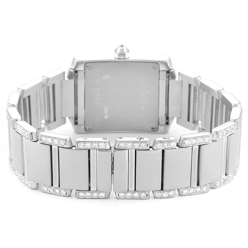 The image shows the back view of a Cartier Tank Francaise WE1002SF Women
s White Gold Silver Dial WE1002SF Women
s White Gold Silver Dial watch, highlighting its bracelet and caseback.