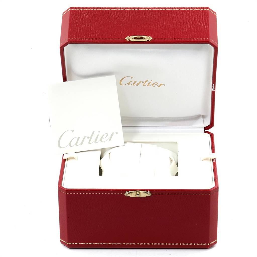 The image shows a Cartier Tank Francaise WE1002S3 Women's White Gold Silver Dial WE1002S3 Women's White Gold Silver Dial watch box with a booklet inside a partially opened red case.
