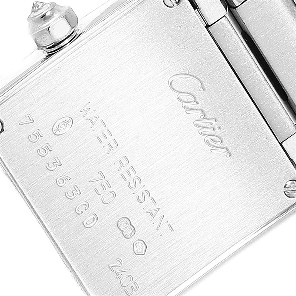 The image shows the back case of a Cartier Tank Francaise WE1002S3 Women's White Gold Silver Dial WE1002S3 Women's White Gold Silver Dial watch at a close-up angle, displaying the brand and model details.