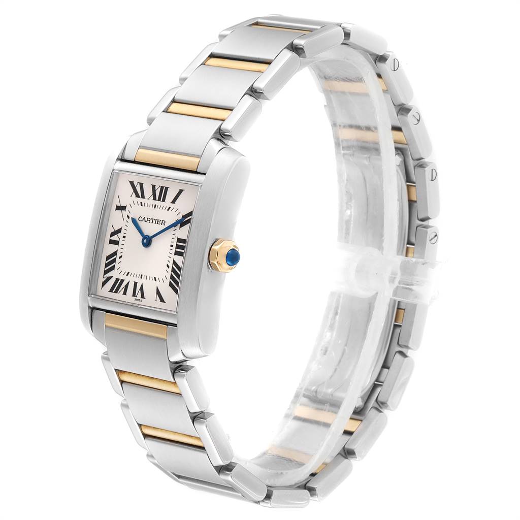 The Tank Française by Cartier is shown at a side angle, displaying the face, strap, and crown detailing.