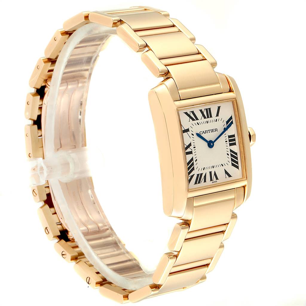 The image shows a side and front angle of a Cartier Tank Francaise W50003N2 Women's Yellow Gold Silver Dial W50003N2 Women's Yellow Gold Silver Dial watch, highlighting its gold bracelet and rectangular face with Roman numerals.