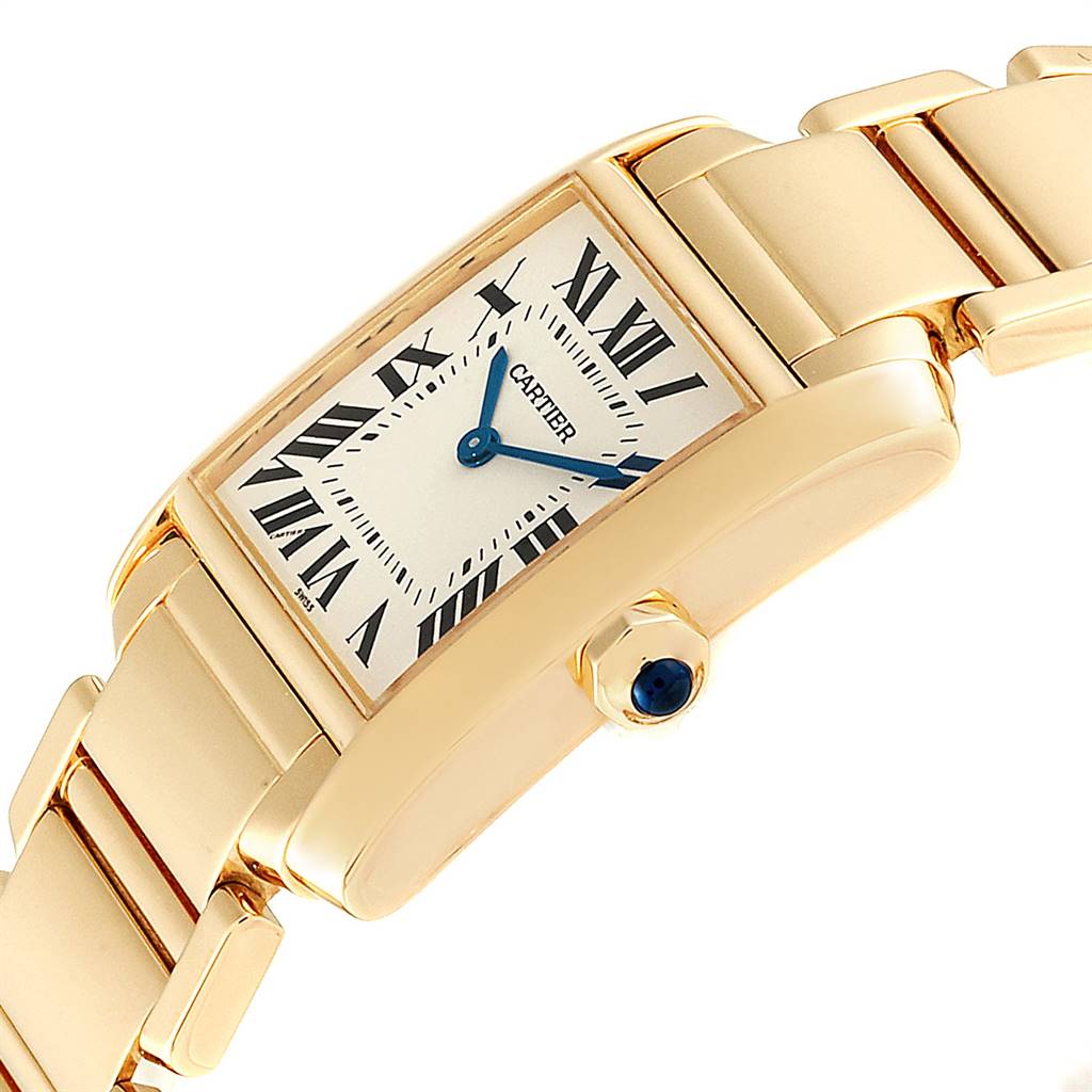 This image shows a close-up of the Cartier Tank Francaise W50003N2 Women's Yellow Gold Silver Dial W50003N2 Women's Yellow Gold Silver Dial watch from a side angle, highlighting the case, dial, and part of the bracelet.