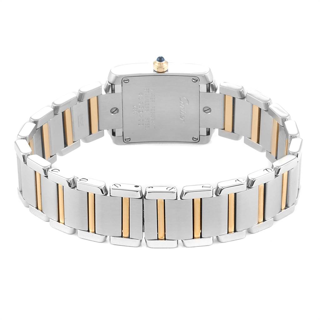 This image shows the back and bracelet of a Cartier Tank Française watch, highlighting its two-tone metal links.