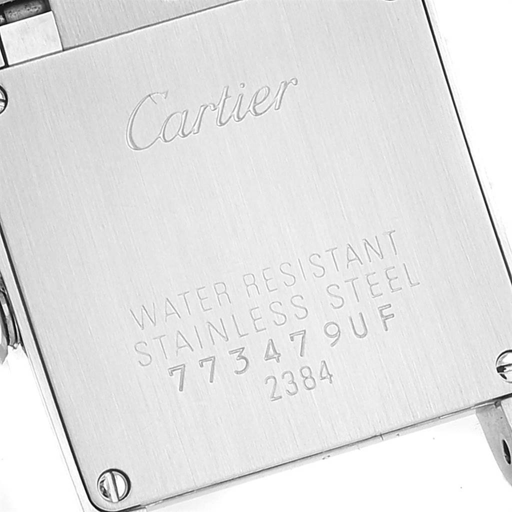 The image shows the back casing of a Cartier Tank Francaise W51008Q3 Women's Stainless Steel Silver Dial W51008Q3 Women's Stainless Steel Silver Dial watch, highlighting the engraved details and model information.
