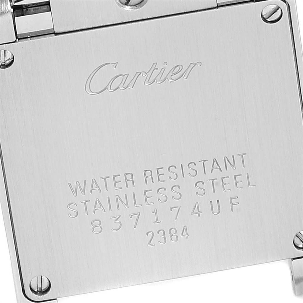 This image shows the back case of the Cartier Tank Française watch displaying its branding and specifications.