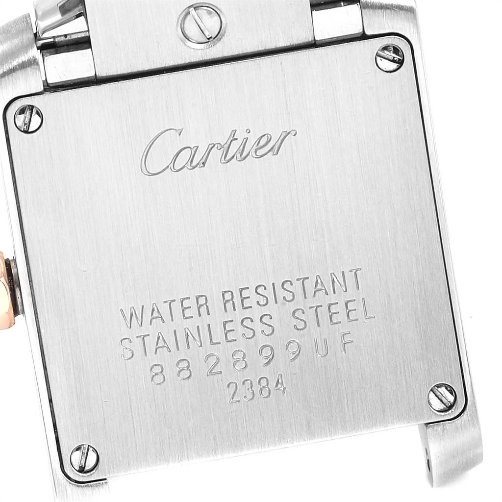 This image shows the back case of a Cartier Tank Française watch, highlighting its stainless steel construction and water resistance details.