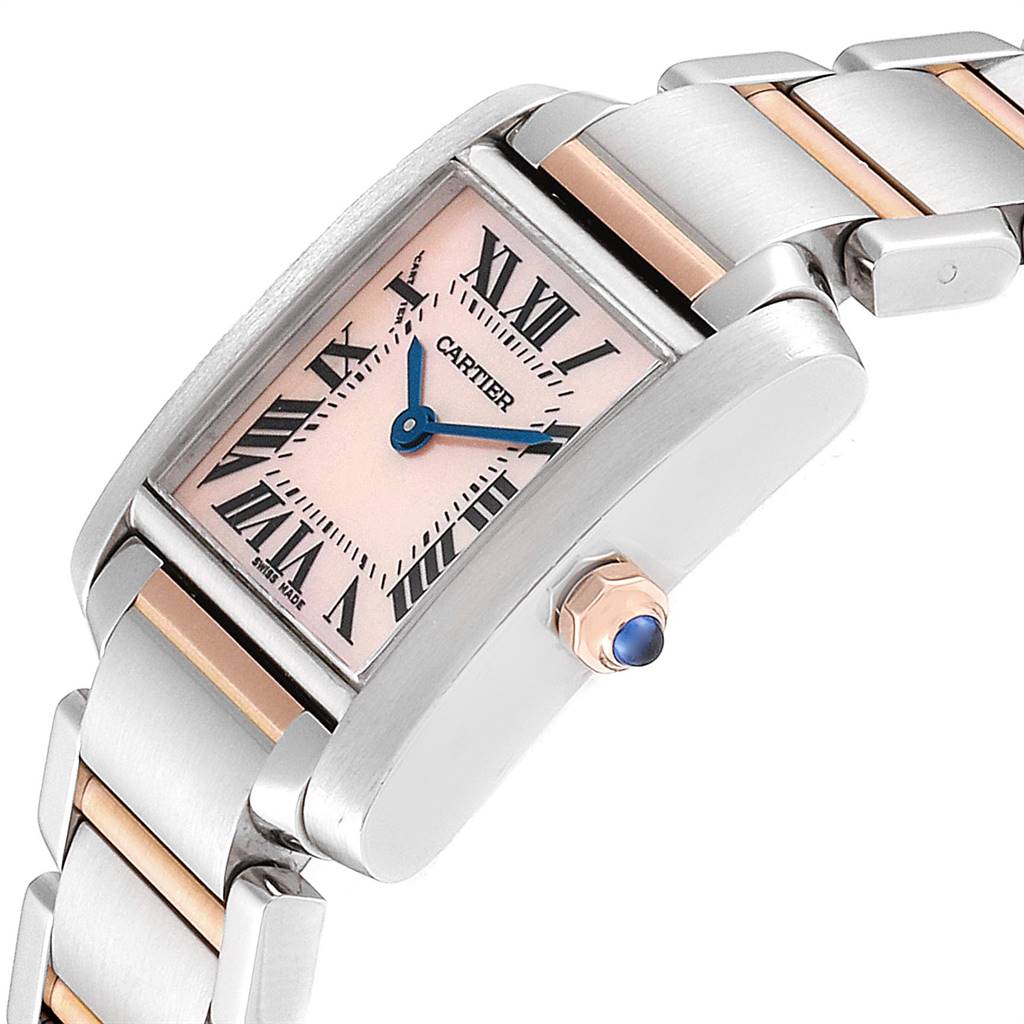 The Cartier Tank Francaise W51027Q4 Women's Steel and Gold (two tone) Mother of Pearl Dial W51027Q4 Women's Steel and Gold (two tone) Mother of Pearl Dial watch is shown at an angle displaying its face, roman numerals, blue hands, and the crown with a blue cabochon.